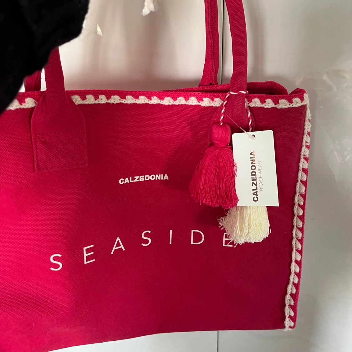 Oanvänd väska från Calzedonia