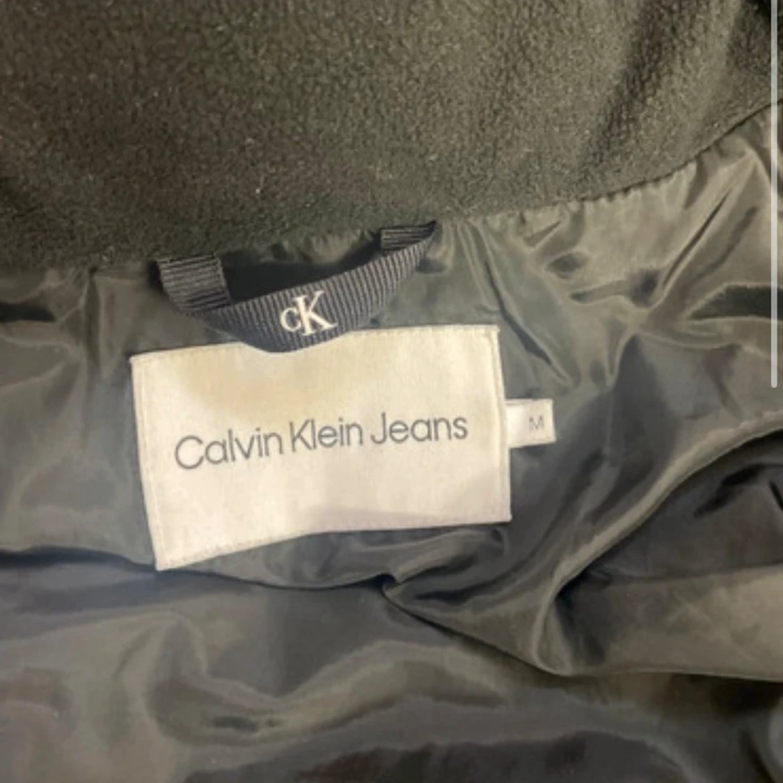 Svart dunjacka från Calvin Klein - 92