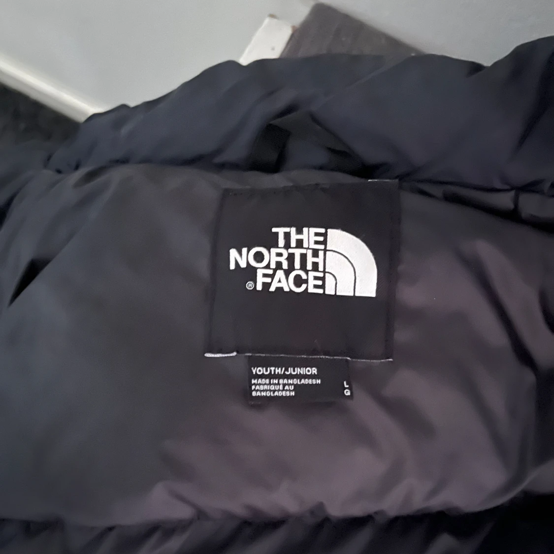 Lila pufferjacka från The North Face - 91