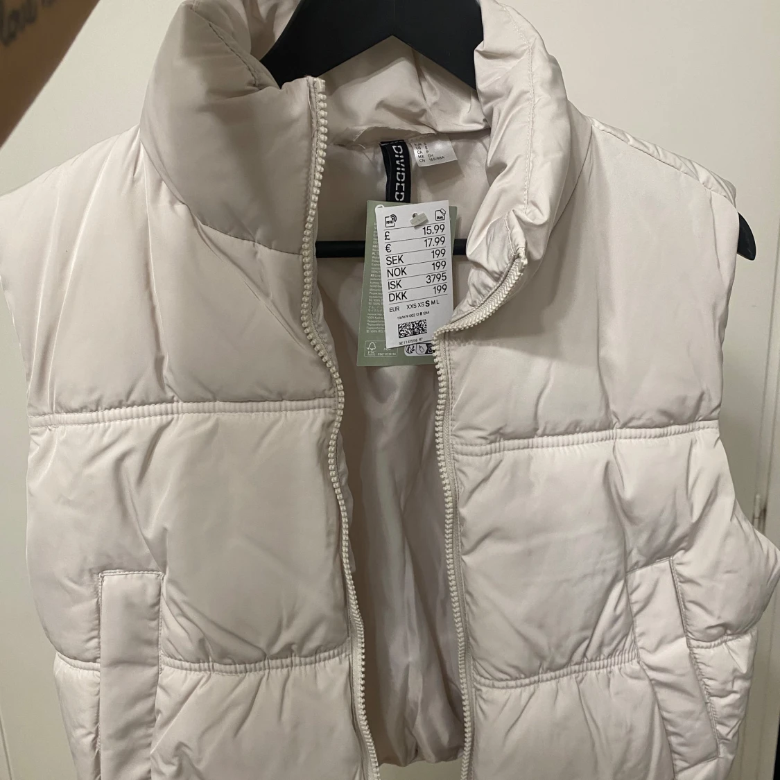 Vit dunväst från H&M