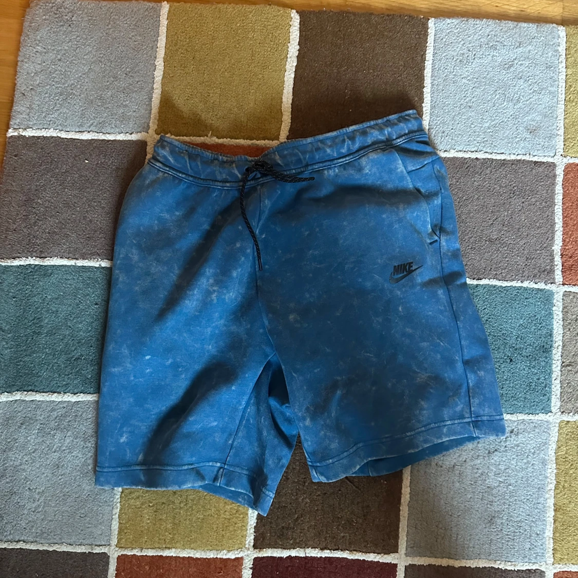 Blå shorts från Nike tech fleece