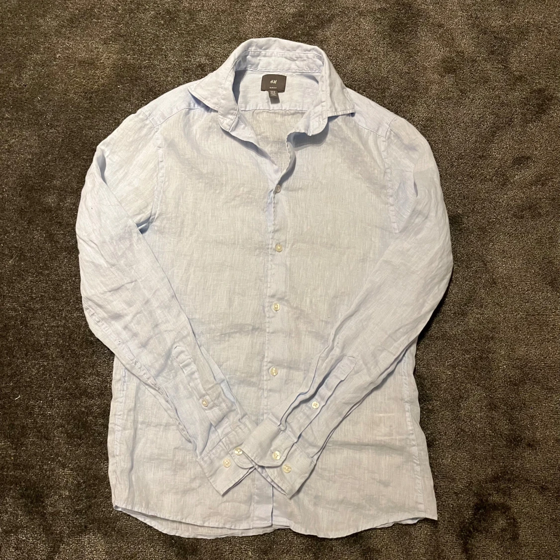 Ljusblå linneskjorta från H&M