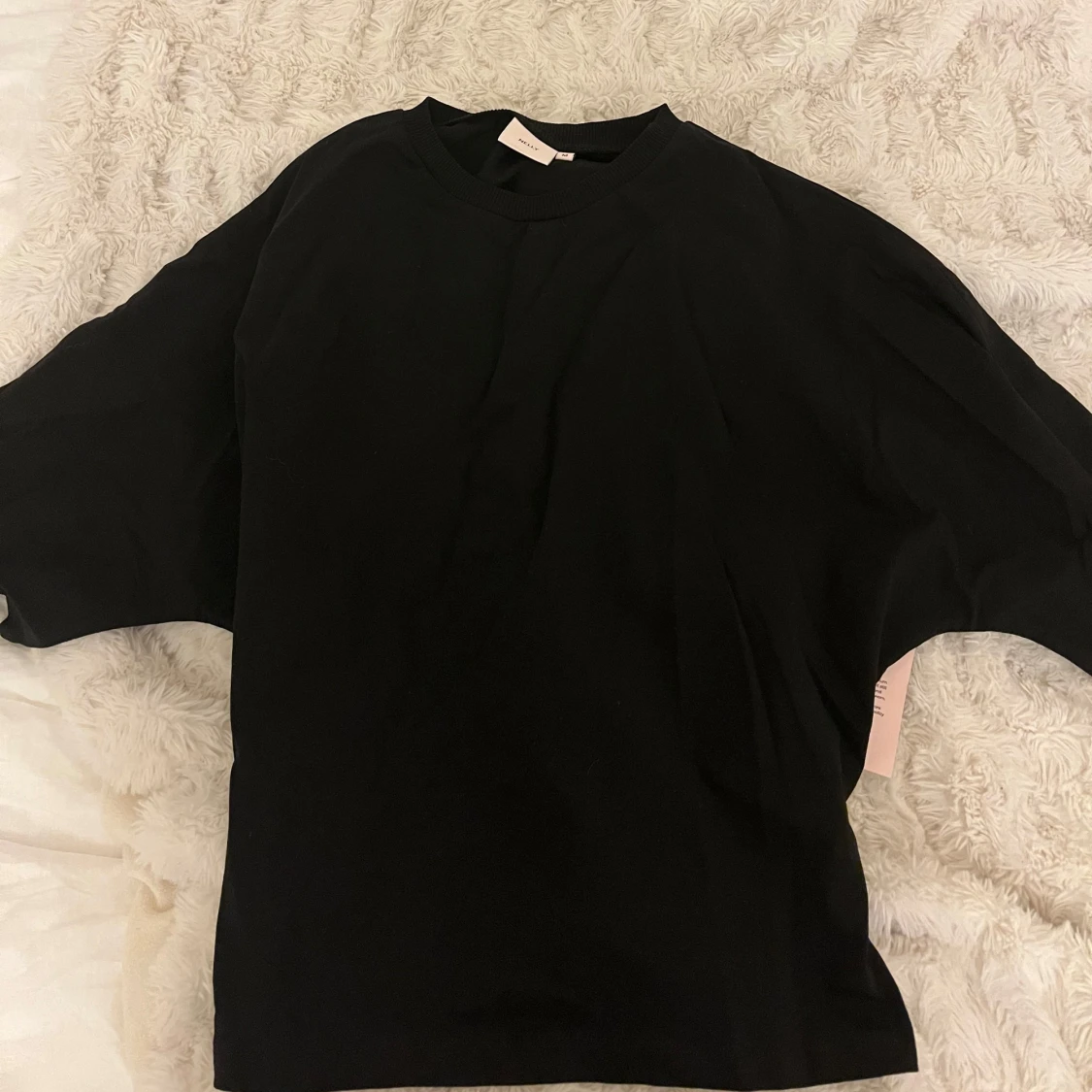 Svart topp med knytband - 92