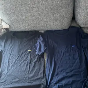 Hej, säljer 2 Hugo boss t shirts, en mörkblå och en svart.