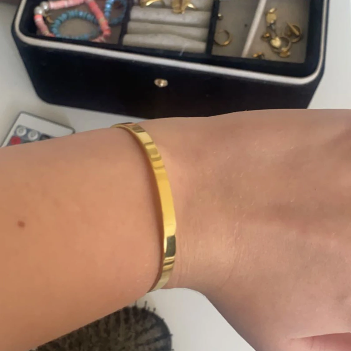 Justeratbart armband i guld