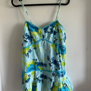  colorful top - Never worn before! Great condition 👌 it doesn’t have a label with a size but I would say it’s a size S