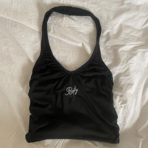 svart halterneck topp - cool svart halterneck topp!