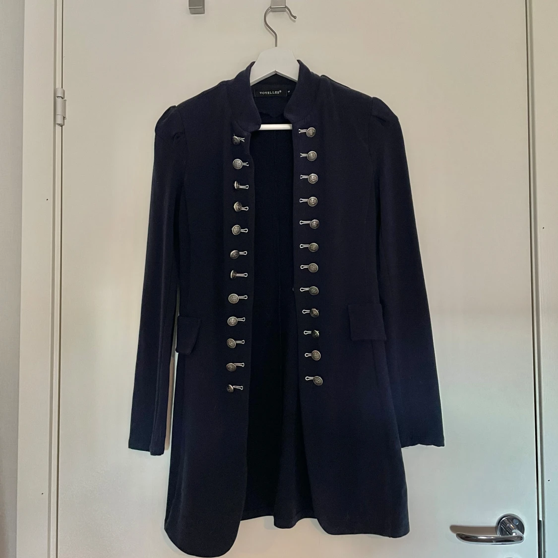 Mörkblå skepparkappa