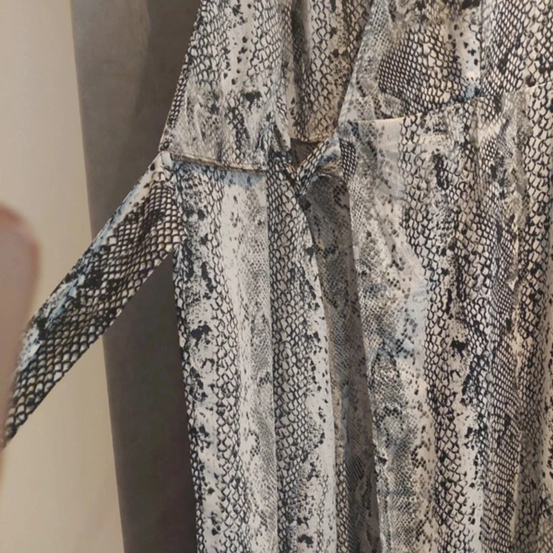 Lång omlott klänning