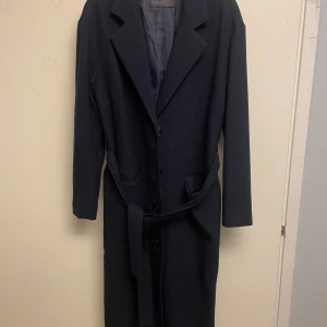 Kappa - Super fin lång Ull kappa från Levis storlek M oanvänd.