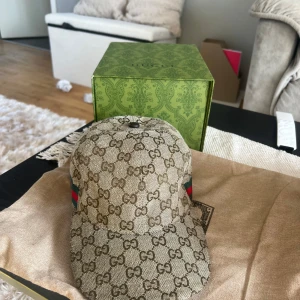 Gucci keps - Säljer en Gucci keps då den ej kommer till användning 