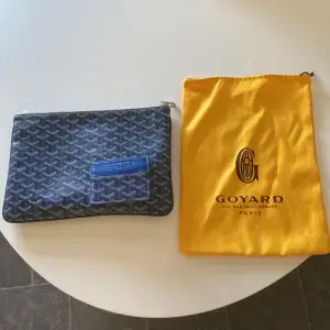 Nyskick matchande goyard väska och korthållare.