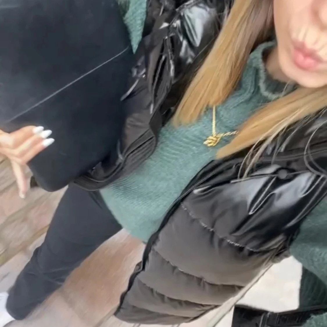 Svart lång dunväst