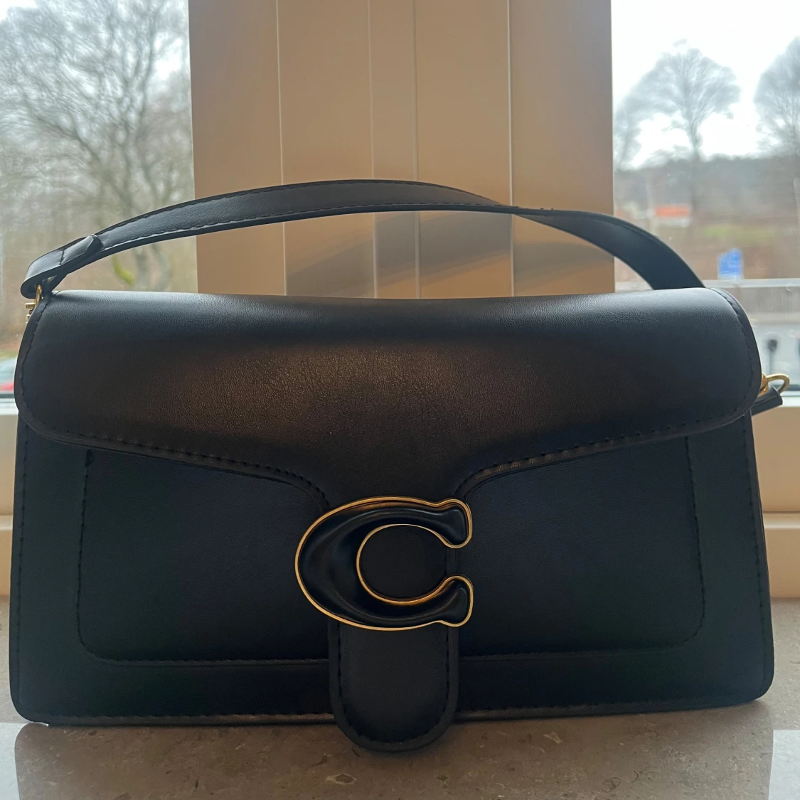 Svart axelväska från Coach