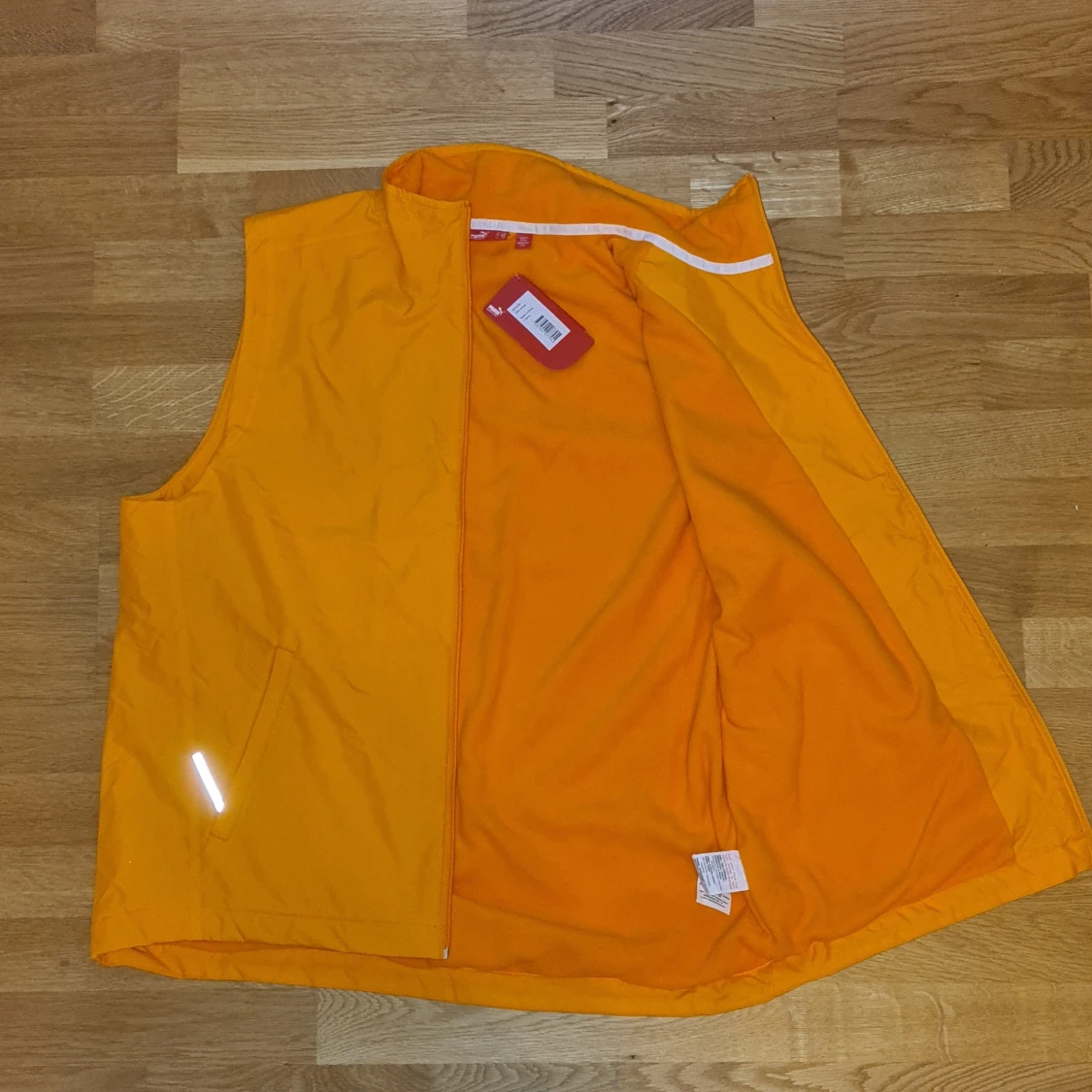 Orange väst från Puma - 91