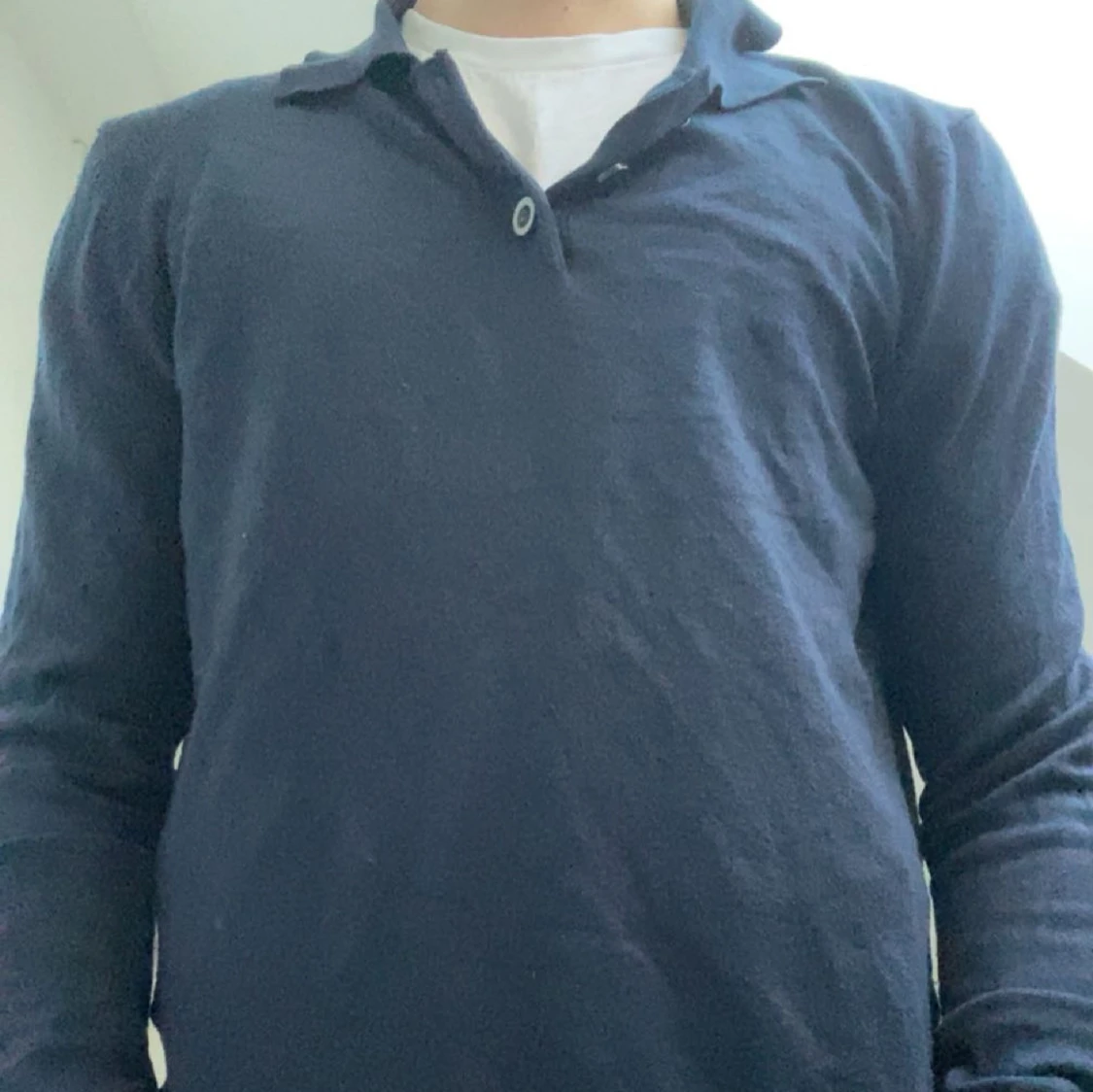 Mörkblå pikétröja 
