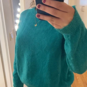 Grön stickad tröja - Jätte fin grön stickad tröja i bra sick!