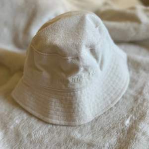 New bucket hat, never worn! Cream colour.