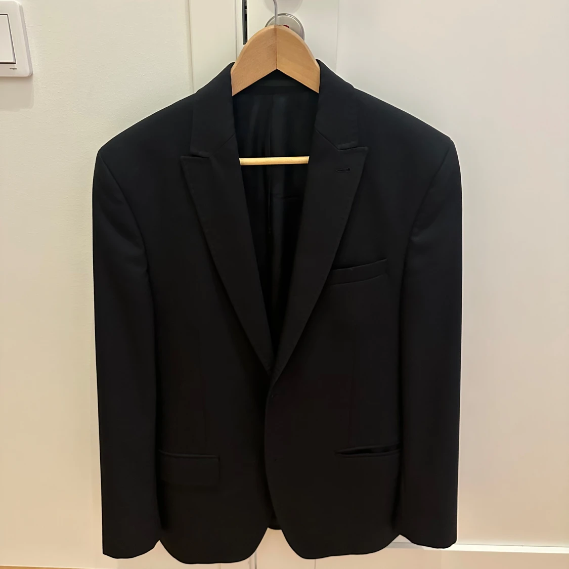 Svart kavaj från Riley