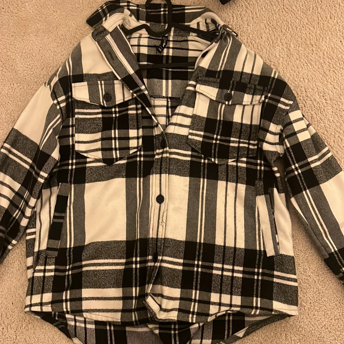 Svartvit rutig jacka