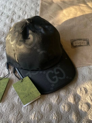 Svart GG Keps Jumbo - Svart Keps Jumbo modell, Storlek M, Möts upp/Fraktar