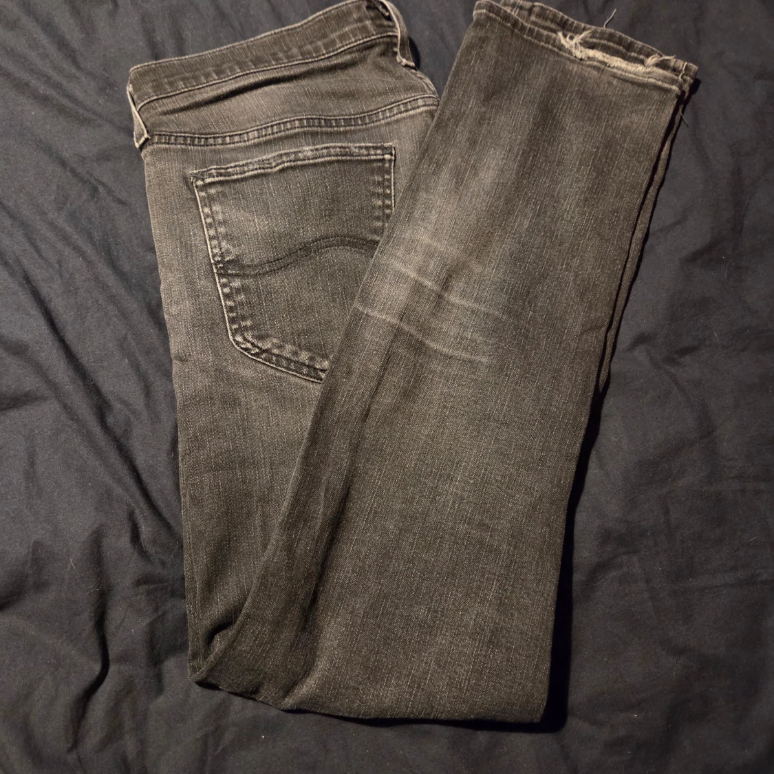 Svarta slim fitt jeans från Lee