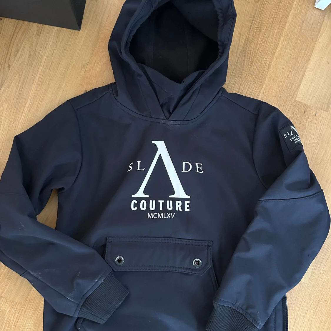 Svart skidjacka från Slade Couture