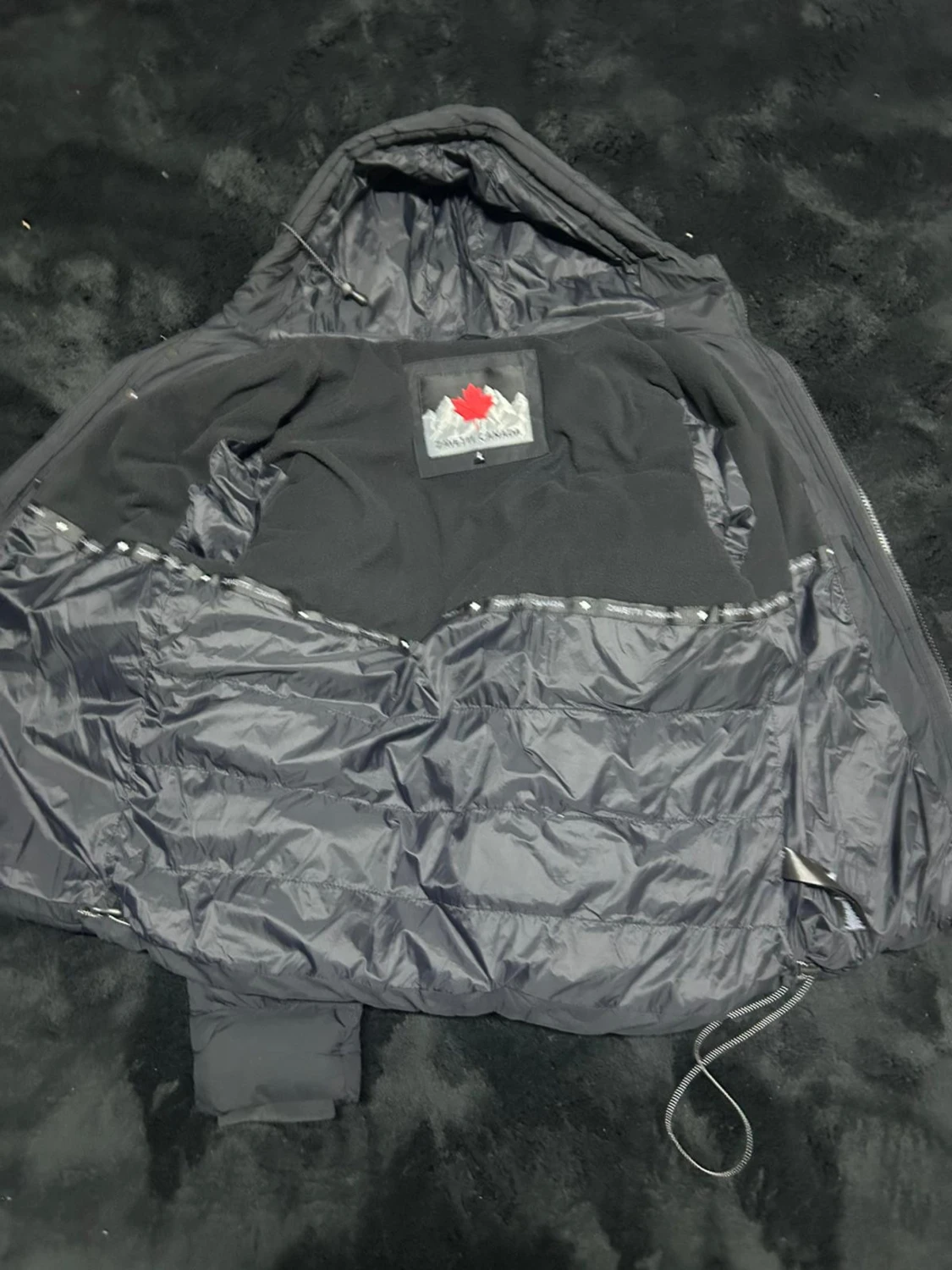 Svart pufferjacka från Zavetti Canada,  priset kan diskuderas 