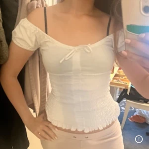 Vit milkmaid babydoll topp - Så fin och smickrande! Stl S