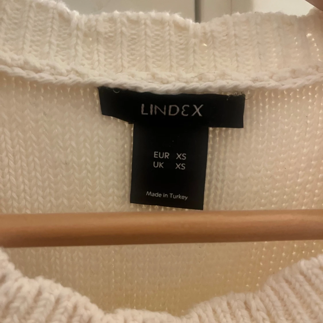 Stickad ärmlös topp med volang Lindex XS - 1