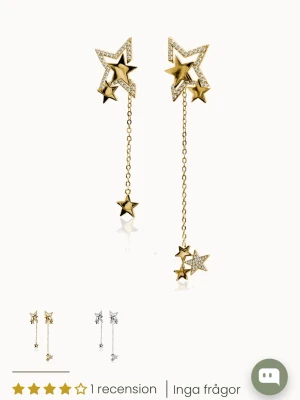 Ioaku multistar örhängen - Säljer ett par helt nya örhängen från ioaku som jag fick i julklapp. De är slutsålda på hemsidan just nu, nypris 599