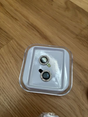 Skydd till kameran  - Skydd för kameran till telefonen. iPhone 12 