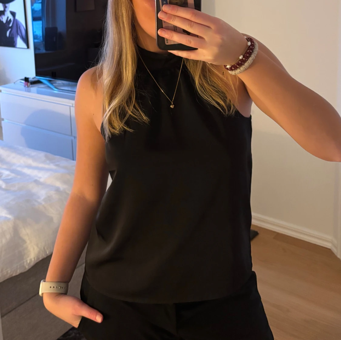 Svart halternecktopp