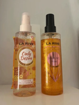 La Rive body mist duo - Två fräscha body mists från La Rive: Only Desire (med vitamin E och provitamin B5, även för hår) och Sparkling Rose. Båda flaskorna innehåller 200 ml och är tillverkade i Polen. Perfekt för dig som vill ha något extra i din vardagsrutin.