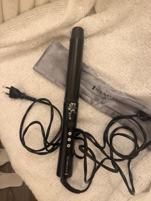 Remington locktång  - Funkar som den ska. Säljs då jag köpt en dyson 