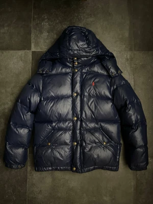 Ralph lauren pufferjacka - Ralph lauren pufferjacket i mycket bra skick, inga större skavanker, storlek L 14-16/ xs