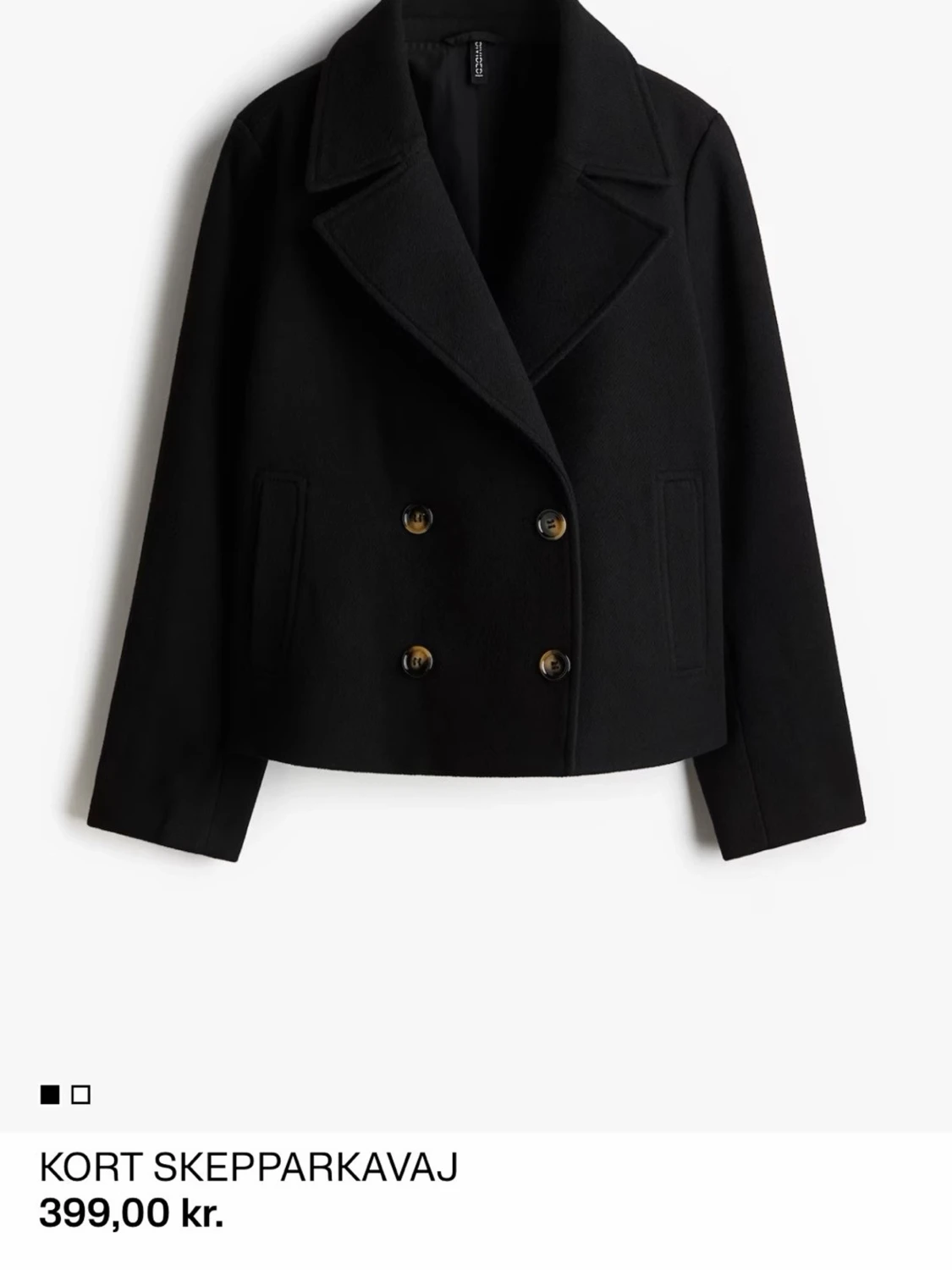 Kort svart skepparkavaj med knappar