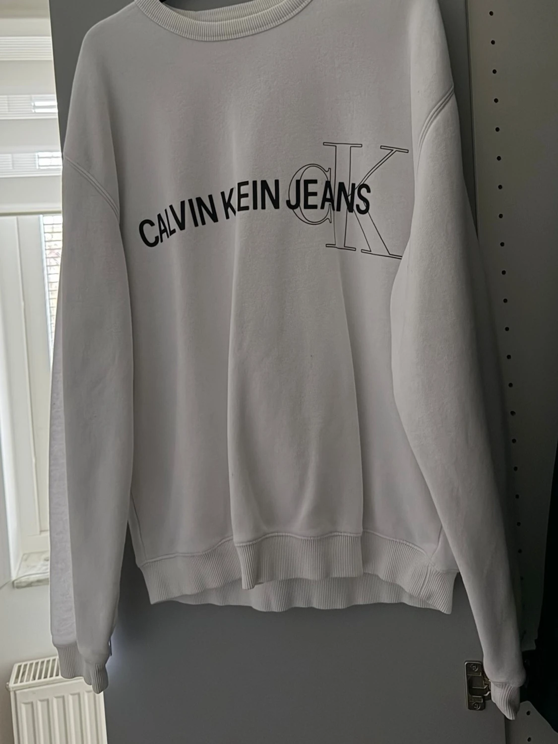 Vit sweatshirt från Calvin Klein Jeans