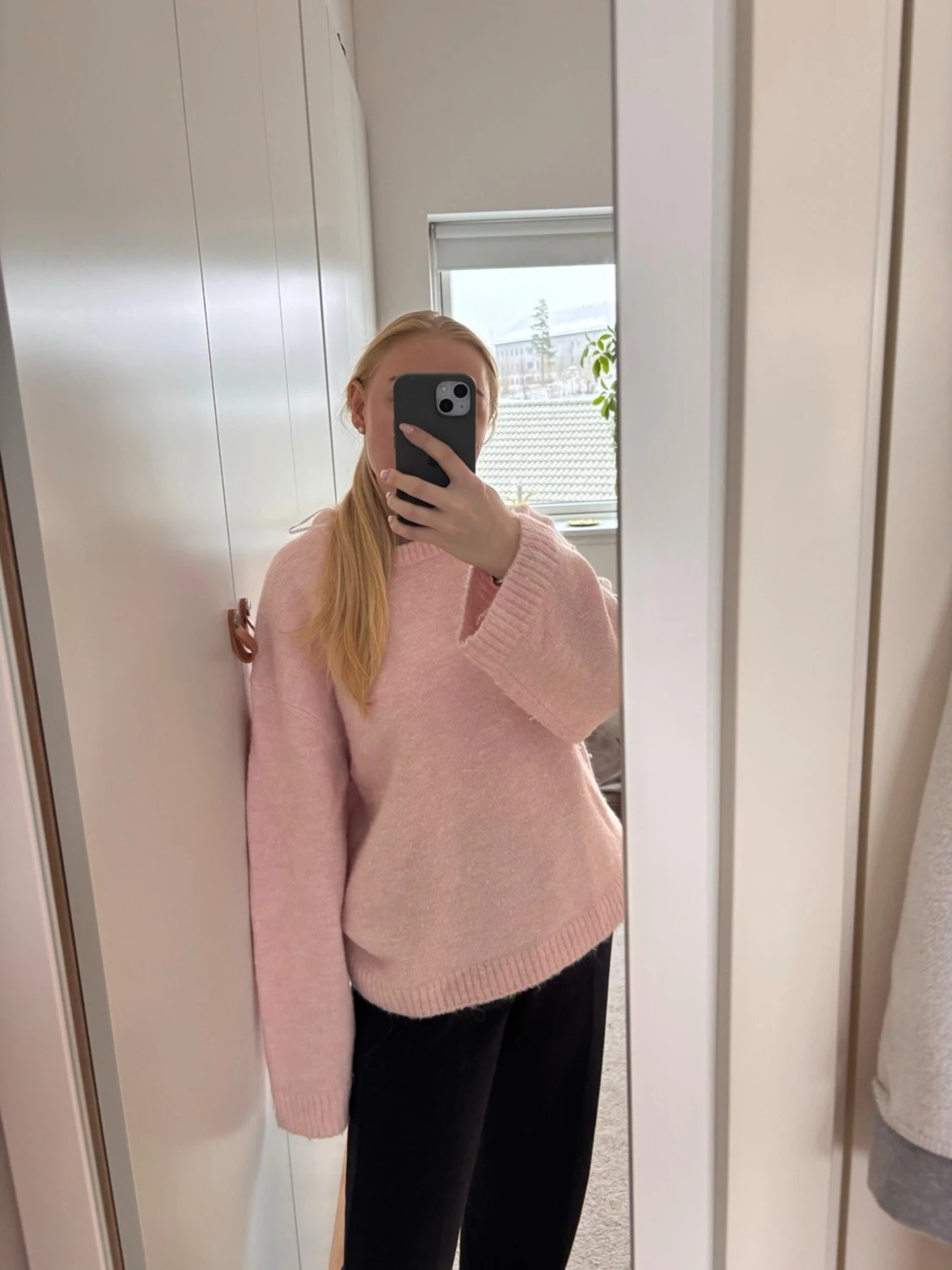 Ljusrosa oversized stickad tröja