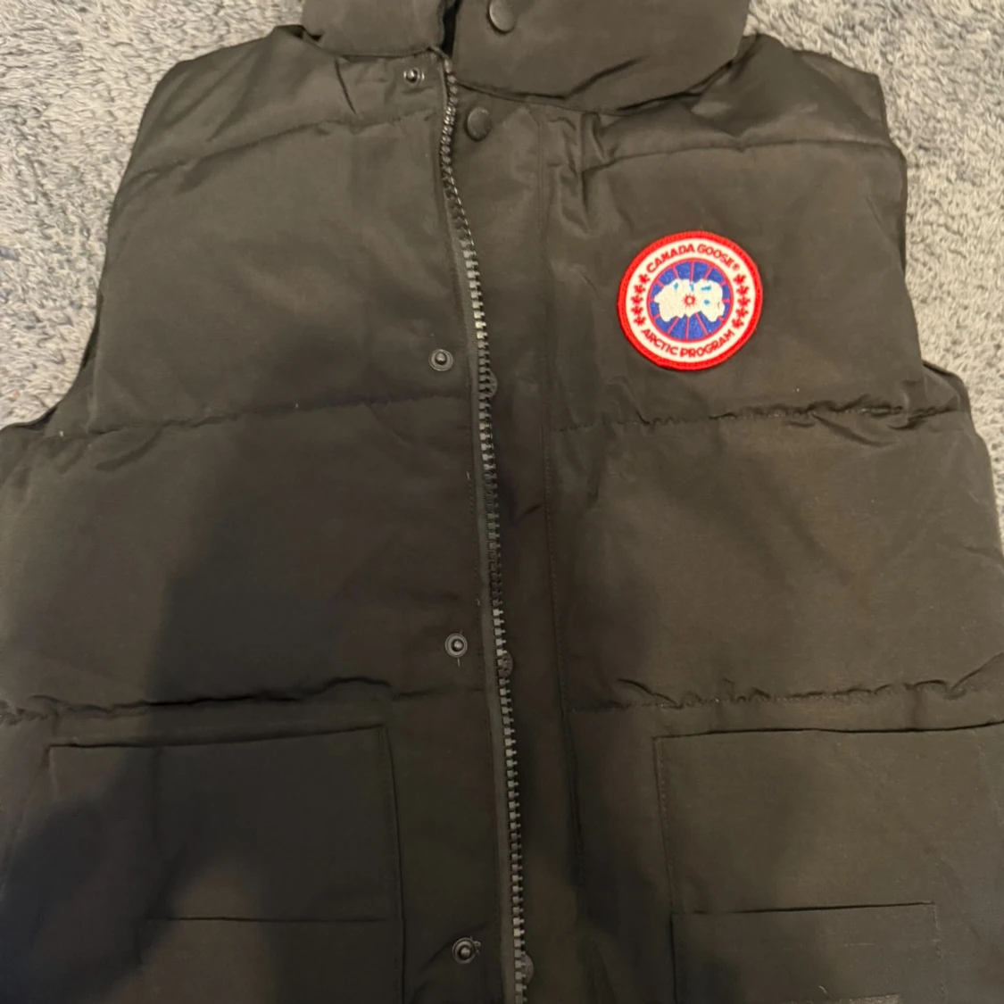 Svart dunväst från Canada Goose