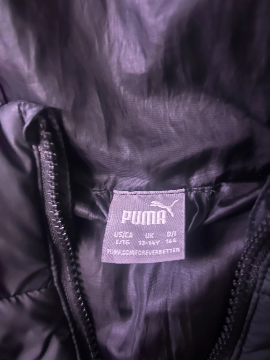 Svart quiltad pufferjacka från Puma - 4