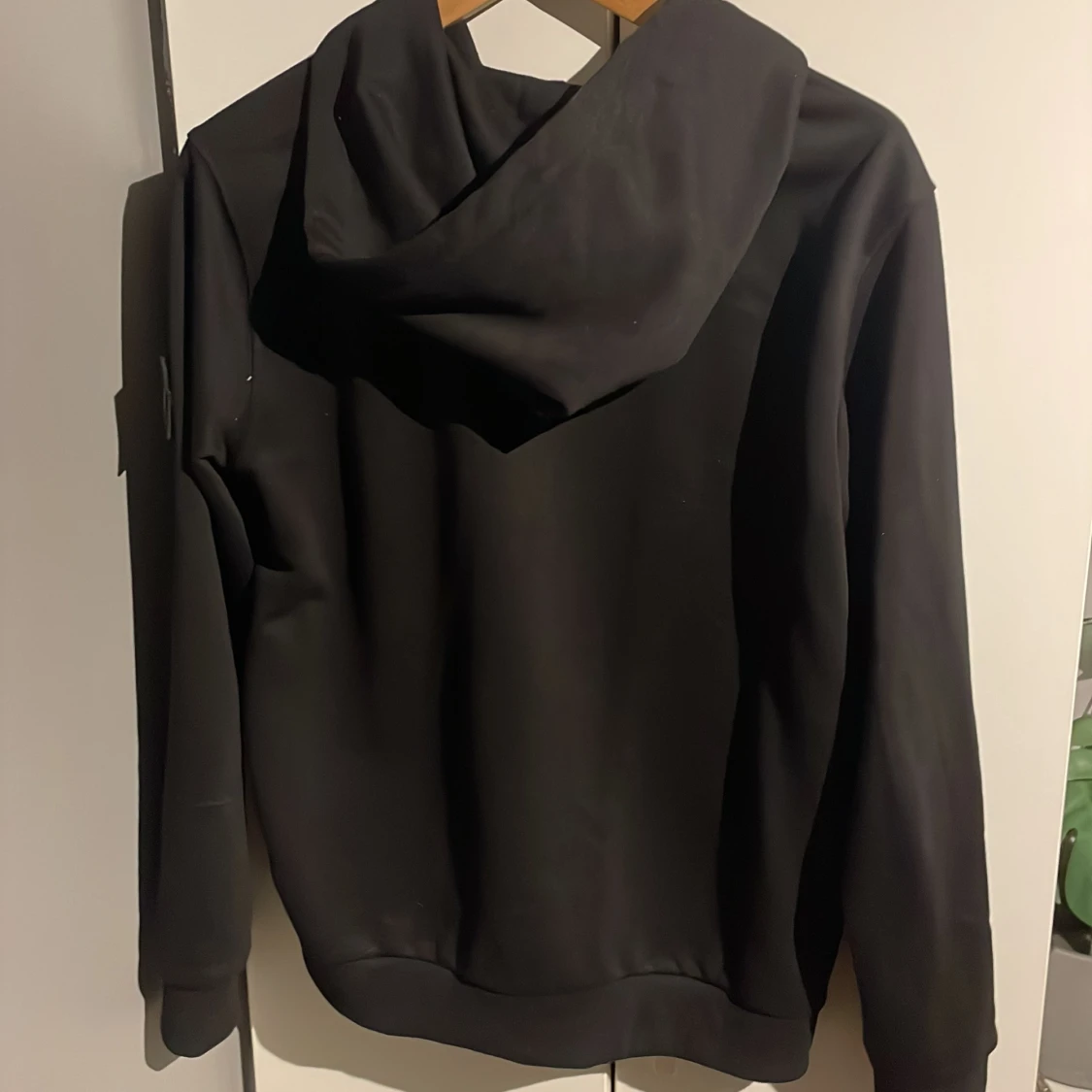 Svart hoodie från Stone Island - 1