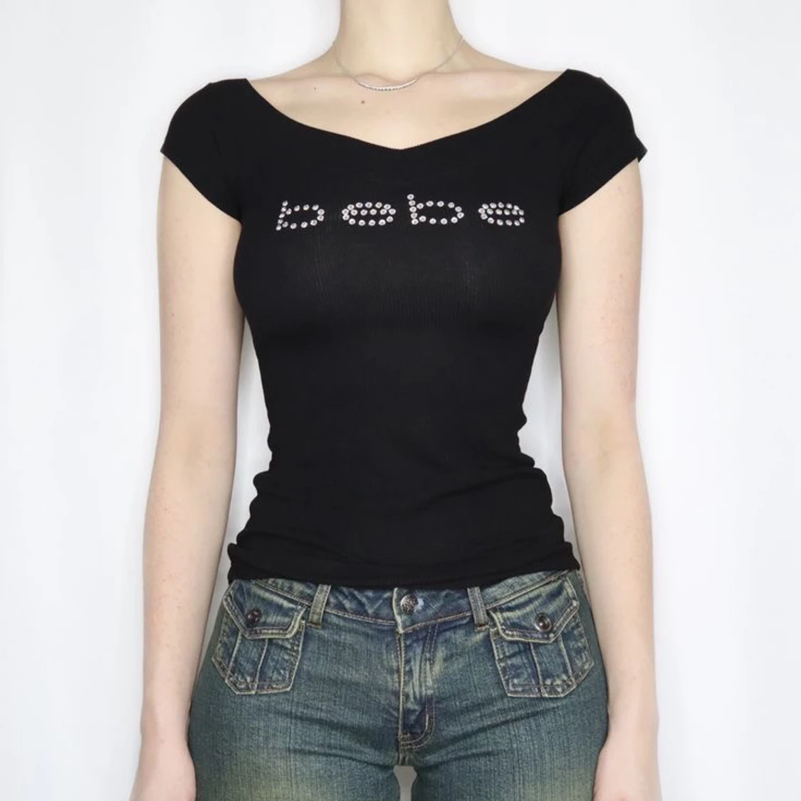 Svart topp med strasslogga från Bebe