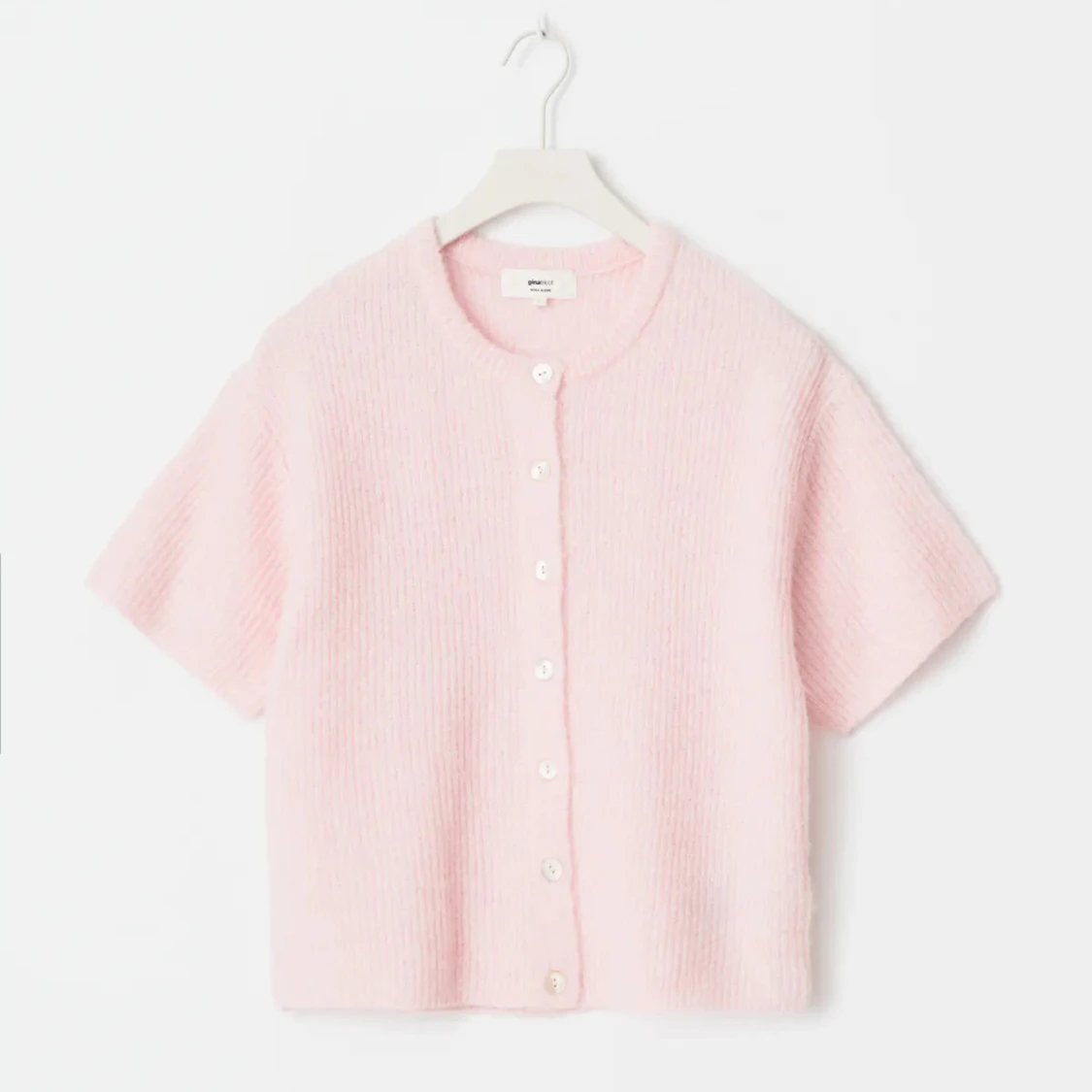 Ljusrosa stickad kofta med kort ärm