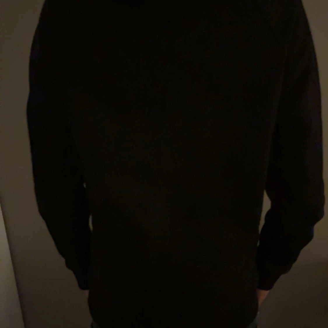 Svart hoodie från Peak Performance - 1