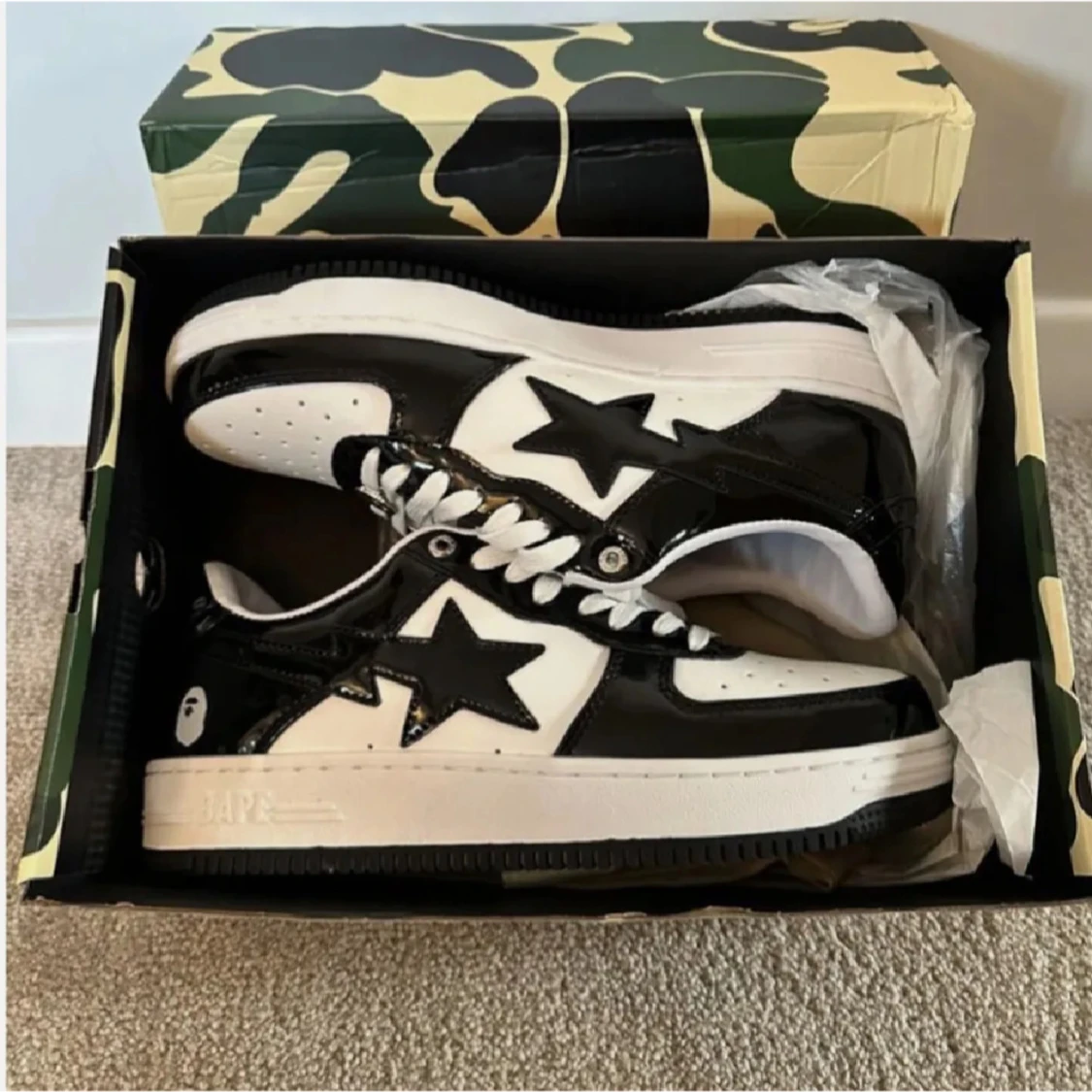 Svarta och vita Bape Sta sneakers