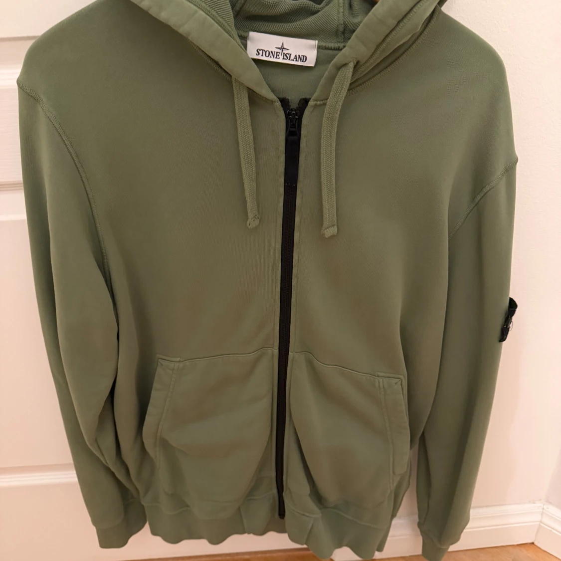 Grön hoodie från Stone Island