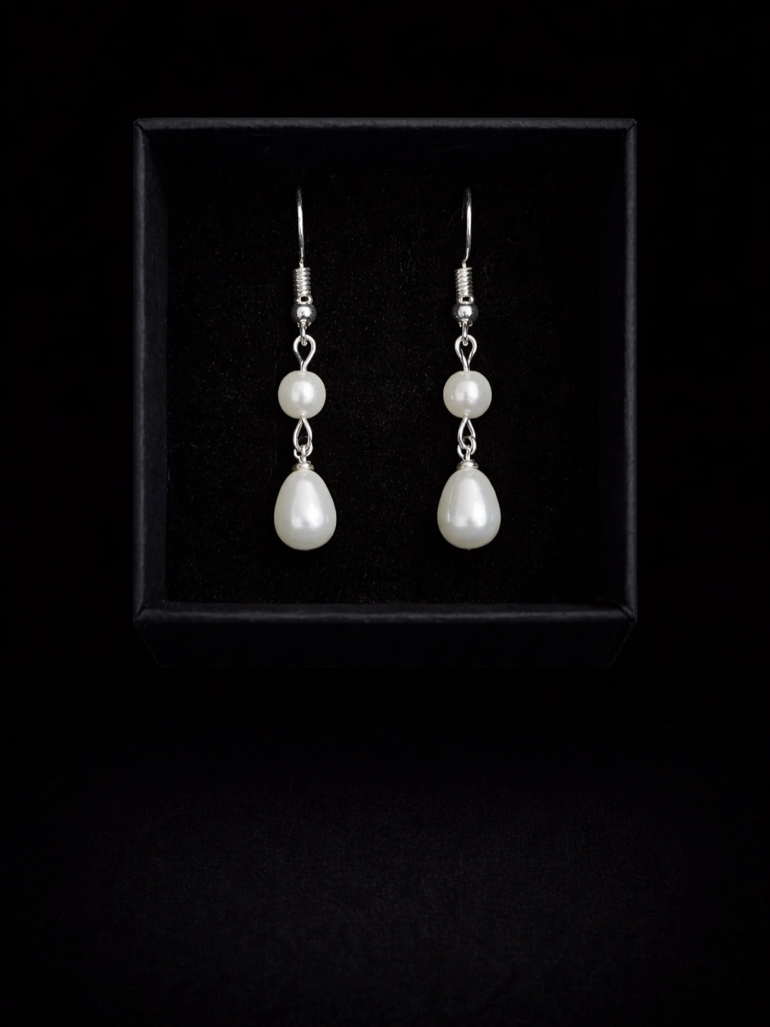 Hängande örhängen med pärlor