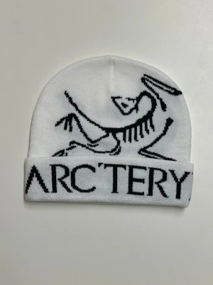 Arcteryx Mössa  - Helt ny aldrig använd. Storlek One Size. Snabb frakt.