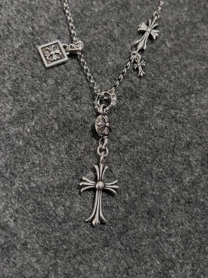 Cross & Tags Rebel Necklace - Stainless steel necklace with strategically layered cross and tag charms capturing rebel edgy energy